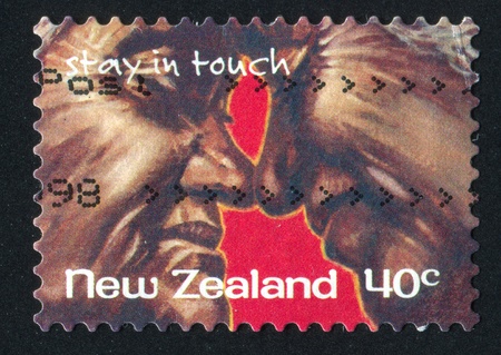 NEW ZEALAND - CIRCA 1998: stamp printed by New Zealand, shows Older Couple with Faces Together, circa 1998のeditorial素材