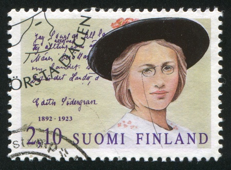 FINLAND - CIRCA 1992: stamp printed by Finland, shows Edith Sodergran,  circa 1992のeditorial素材