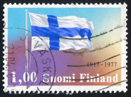 FINLAND - CIRCA 1977: stamp printed by Finland, shows Finnish Flag, circa 1977の写真素材