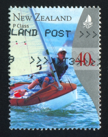 NEW ZEALAND - CIRCA 1999: stamp printed by New Zealand, shows Yachting, P Class, circa 1999のeditorial素材