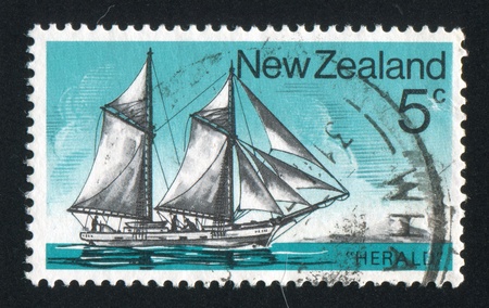 NEW ZEALAND - CIRCA 1975: stamp printed by New Zealand, shows Historic Sailing Ship, Schooner, circa 1975の写真素材