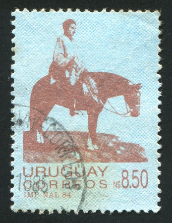 URUGUAY - CIRCA 1984: stamp printed by Uruguay, shows Artigas on the Plains, circa 1984のeditorial素材