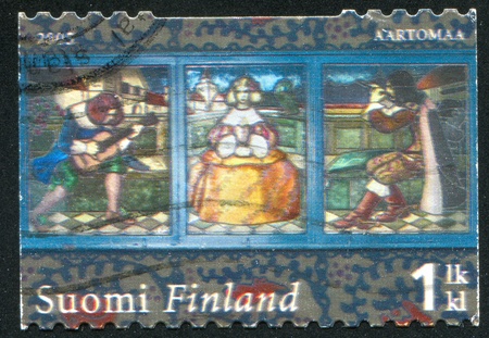 FINLAND - CIRCA 2005:  stamp printed by Finland, shows stained glass window, circa 2005の写真素材