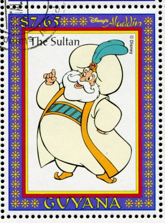 GUYANA - CIRCA 1993: stamp printed by GUYANA, shows Aladdin, Disney animated film, Sultan of Agrabah, circa 1993のeditorial素材