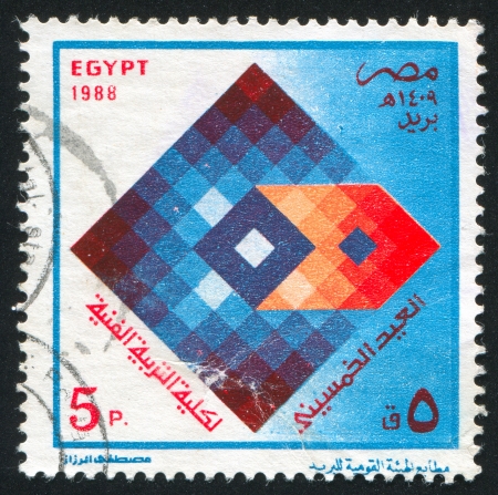 EGYPT - CIRCA 1988: stamp printed by Egypt, shows Faculty of Art Education Emblem, circa 1988の写真素材