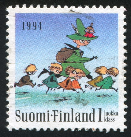 FINLAND - CIRCA 1994: stamp printed by Finland, shows Moomin characters, Seven running, circa 1994のeditorial素材