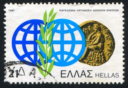 GREECE - CIRCA 1981: stamp printed by Greece, shows World, coins,finance, circa 1981