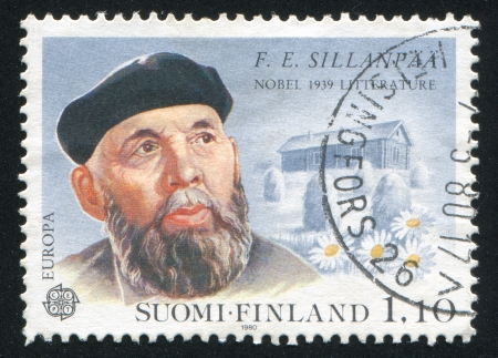 FINLAND - CIRCA 1980: stamp printed by Finland, shows Portrait of Writer Frans Eemil Sillanpaa, circa 1980のeditorial素材