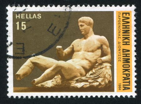 GREECE - CIRCA 1984: stamp printed by Greece, shows Sculpture, Dionysus, circa 1984のeditorial素材
