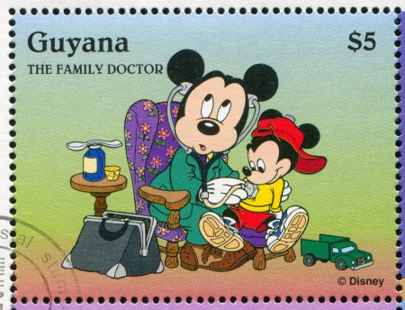 GUYANA - CIRCA 1995: stamp printed by Guyana, shows Walt Disney characters, Mickey Mouse, circa 1995のeditorial素材