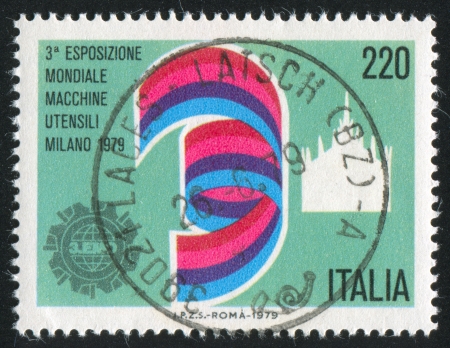 ITALY - CIRCA 1979: stamp printed by Italy, shows Exhibition Emblem, Dome of Milan, circa 1979のeditorial素材