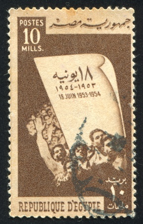 EGYPT - CIRCA 1954: stamp printed by Egypt, shows Crowd acclaiming the Republic, circa 1954のeditorial素材