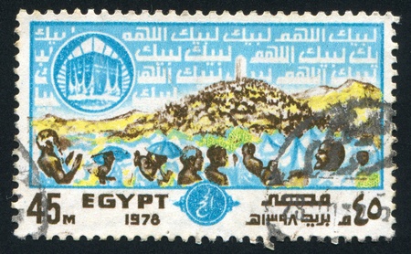 EGYPT - CIRCA 1978: stamp printed by Egypt, shows Pilgrims, Arafat and Holy Kaaba, circa 1978のeditorial素材
