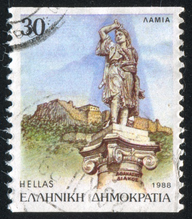 GREECE - CIRCA 1988: stamp printed by Greece, shows Statue of Athanasios Diakos and Castle, Lamia, circa 1988のeditorial素材