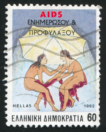 GREECE - CIRCA 1992: stamp printed by Greece, shows Protection against AIDS, circa 1992のeditorial素材