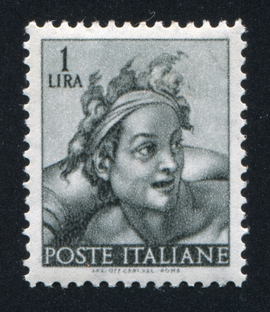 ITALY - CIRCA 1961: stamp printed by Italy, shows Designs from Sistine Chapel by Michelangelo, Slave, circa 1961のeditorial素材