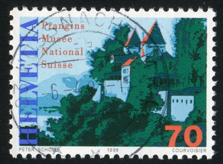 SWITZERLAND - CIRCA 1998: stamp printed by Switzerland, shows Prangins castle, circa 1998のeditorial素材
