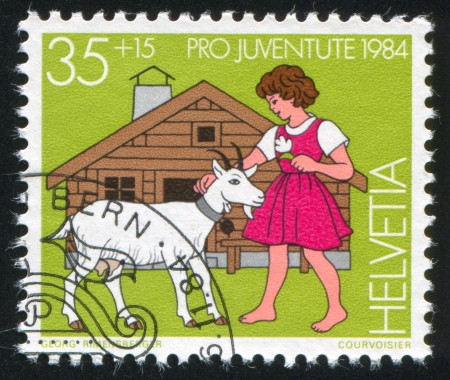 SWITZERLAND - CIRCA 1984: stamp printed by Switzerland, shows Heidi, Girl,  circa 1984のeditorial素材