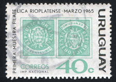URUGUAY - CIRCA 1965: stamp printed by Uruguay, shows Tete Beche Pair of 1864, circa 1965のeditorial素材