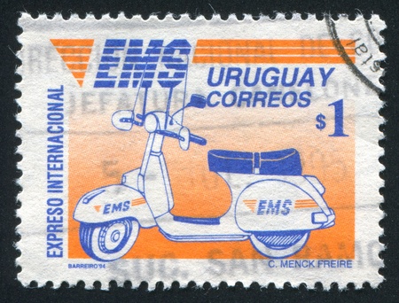 URUGUAY - CIRCA 1994: stamp printed by Uruguay, shows Motorcycle, circa 1994のeditorial素材