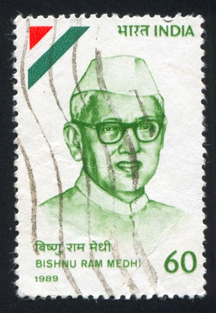 INDIA - CIRCA 1989: stamp printed by India, shows Bishu Ram Medhi (1888-1981), politician, circa 1989のeditorial素材