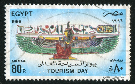 EGYPT - CIRCA 1996: stamp printed by Egypt, shows Woman, signs, circa 1996のeditorial素材