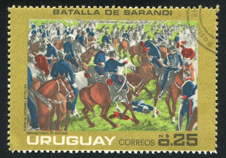 URUGUAY - CIRCA 1975: stamp printed by Uruguay, shows Battle of Sarandi, circa 1975のeditorial素材