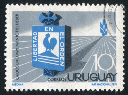 URUGUAY - CIRCA 1971: stamp printed by Uruguay, shows Symbol of Liberty and Order, circa 1971のeditorial素材