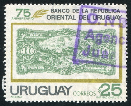 URUGUAY - CIRCA 1971: stamp printed by Uruguay, shows Banknote of 1896, circa 1971のeditorial素材