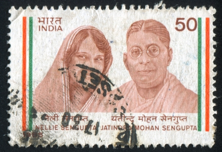 INDIA - CIRCA 1985: stamp printed by India, shows political activists Nellie and Jatindra Mohan Sengupta, circa 1985のeditorial素材