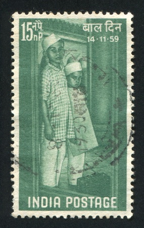 INDIA - CIRCA 1959: stamp printed by India, shows two boys, circa 1959のeditorial素材
