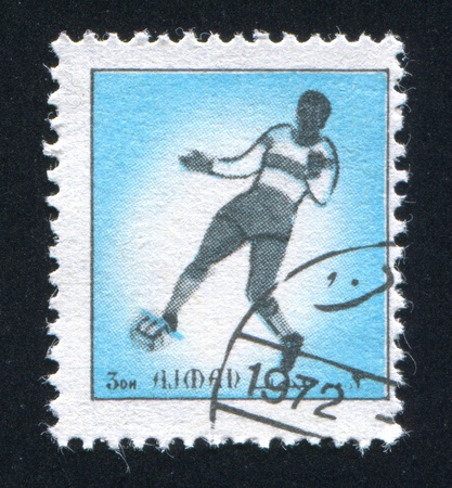 AJMAN - CIRCA 1972: stamp printed by Ajman, shows football, circa 1972のeditorial素材