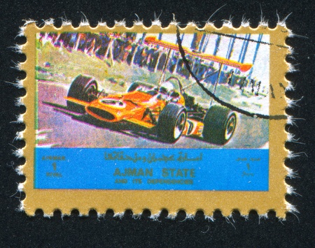 AJMAN - CIRCA 1972: stamp printed by Ajman, shows formula, circa 1972のeditorial素材