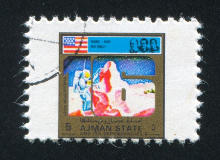 AJMAN - CIRCA 1972: stamp printed by Ajman, shows astronaut, circa 1972のeditorial素材