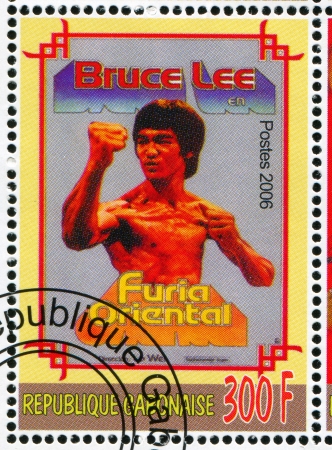 GABON - CIRCA 2006: stamp printed by Gabon, shows Poster Bruce Lee, circa 2006のeditorial素材