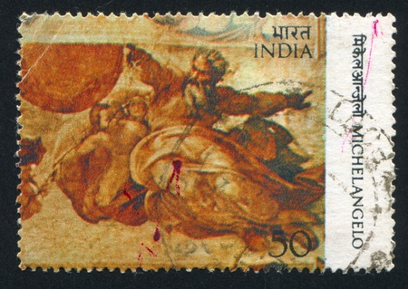 INDIA - CIRCA 1975: stamp printed by India, shows fresco by Michelangelo, circa 1975のeditorial素材