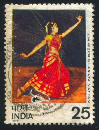 INDIA - CIRCA 1975: stamp printed by India, shows woman dancing Bharata Natyam, circa 1975のeditorial素材
