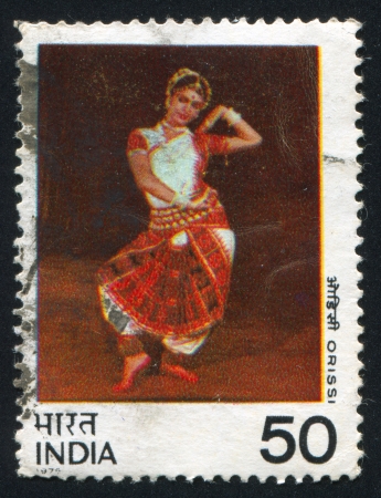 INDIA - CIRCA 1975: stamp printed by India, shows woman dancing Orissi, circa 1975のeditorial素材
