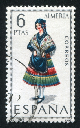 SPAIN - CIRCA 1967: stamp printed by Spain, shows woman Regional Costumes, circa 1967.のeditorial素材
