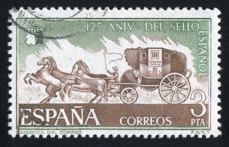 SPAIN - CIRCA 1975: stamp printed by Spain, shows Mail Stagecoach, circa 1975のeditorial素材