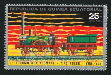 EQUATORIAL GUINEA - CIRCA 1983:  stamp printed by Equatorial Guinea, shows locomotive, circa 1983.のeditorial素材