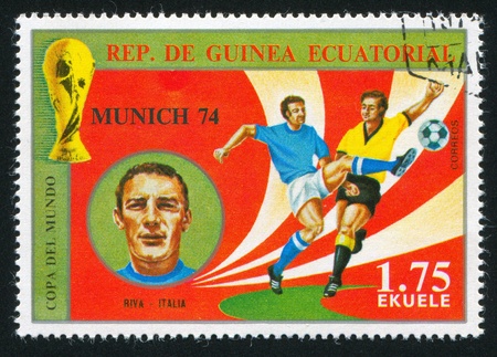 EQUATORIAL GUINEA - CIRCA 1974:  stamp printed by Equatorial Guinea, shows soccer, circa 1974.のeditorial素材