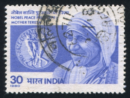 INDIA - CIRCA 1980: stamp printed by India, shows Mother Teresa, Nobel Peace Prize Medallion, circa 1980のeditorial素材