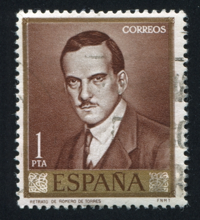 SPAIN- CIRCA 1965: stamp printed by Spain, shows portrait of Julio Romero de Torres, circa 1965のeditorial素材