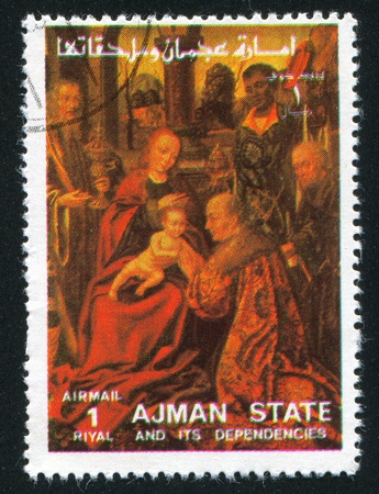 AJMAN - CIRCA 1976: stamp printed by Ajman, shows Virgin Mary and Child, circa 1976のeditorial素材