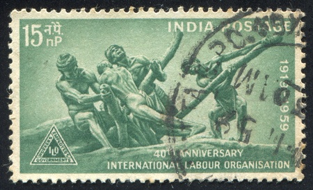 INDIA - CIRCA 1959: stamp printed by India, shows Triumph of Labor statue, circa 1959のeditorial素材