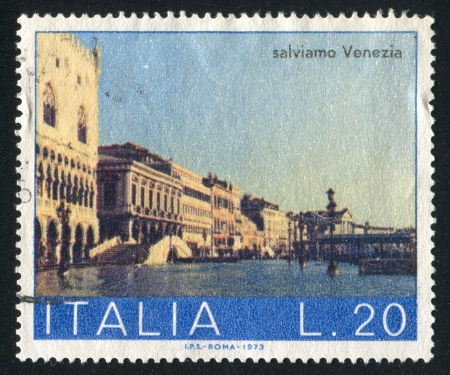 ITALY - CIRCA 1973: stamp printed by Italy, shows Schiavone Shore, circa 1973のeditorial素材