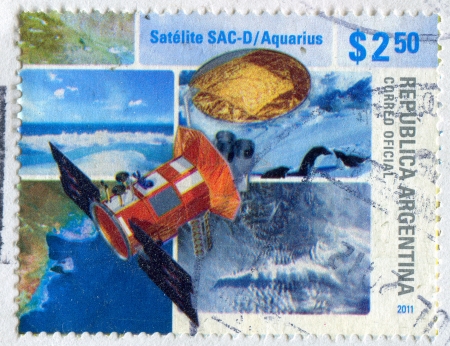 ARGENTINA - CIRCA 2011: stamp printed by Argentina, shows Satellite Aquarius, circa 2011のeditorial素材