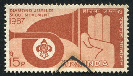 INDIA - CIRCA 1967: stamp printed by India, shows Bugle, Scout Emblem and Scout Sign, circa 1967