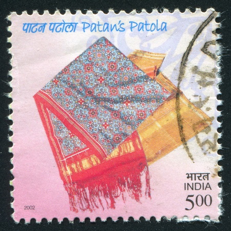 INDIA - CIRCA 2002: stamp printed by India, shows fabric, circa 2002のeditorial素材